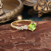 Rounded Peridot Promise Ring with Six Claw Classic Setting